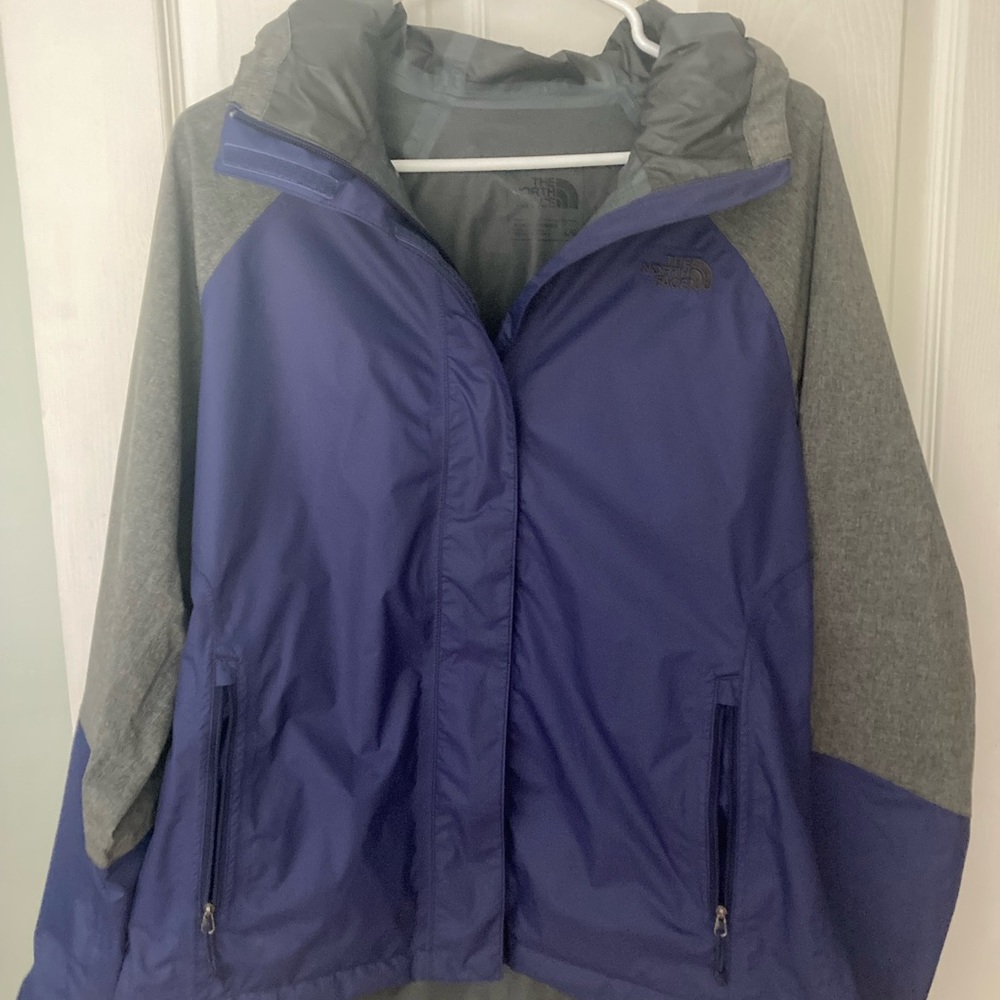 Woman’s north face rain jacket